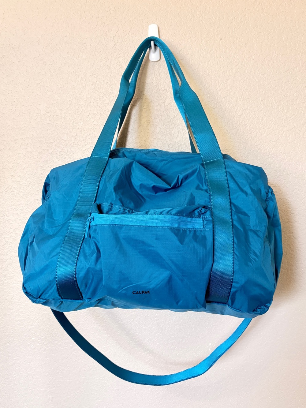 Calpak Compakt duffle Turquoise Blue. NWOT
